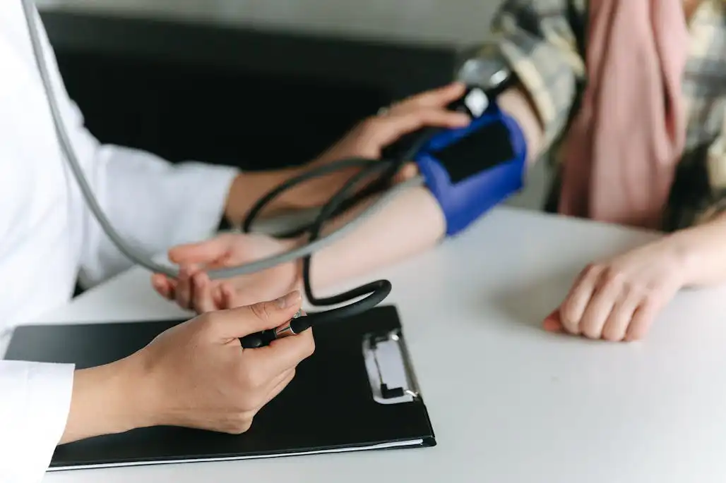 Doctor examining a patient after a car accident injury in North Carolina